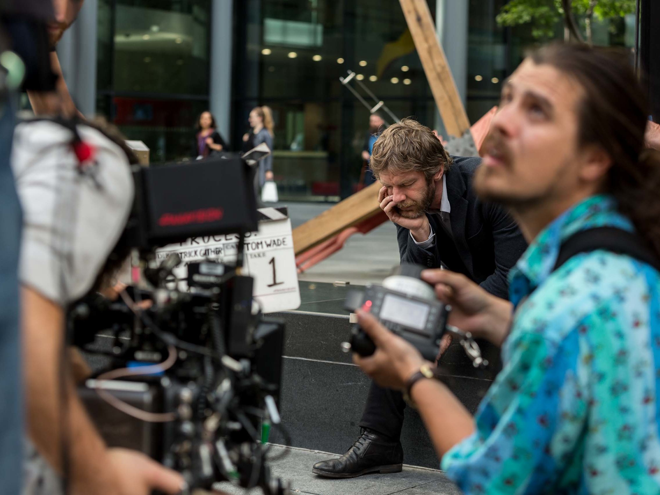 Behind the scenes on a professional film set during a production.